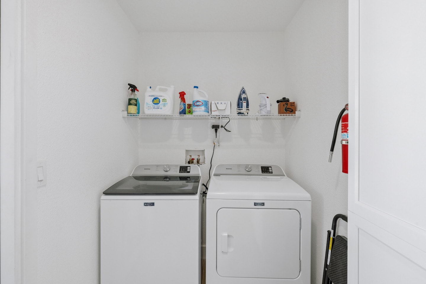 Laundry room with washer and dryer