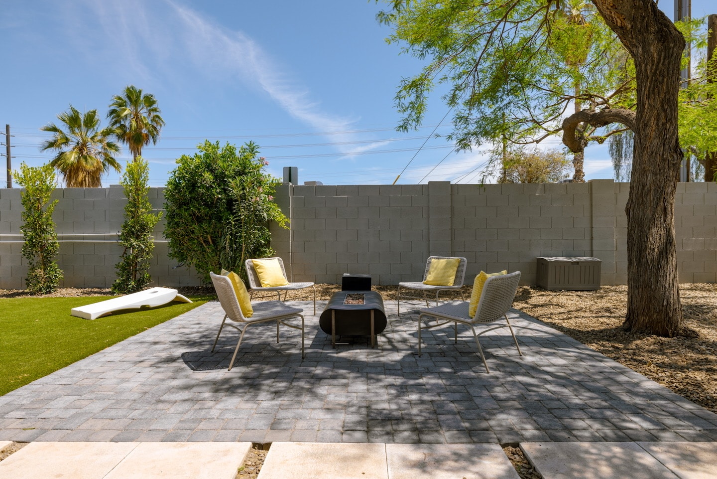 Backyard patio with gas fire pit seating
